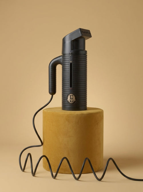 E-steam Jiffy travel garment steamer front to side picture sold by Best Steamers